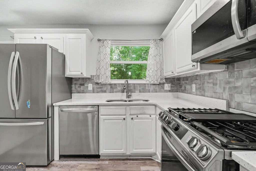 Photo of 5425 Timor Trail, Lithonia, GA 30038 (MLS # 10826505)