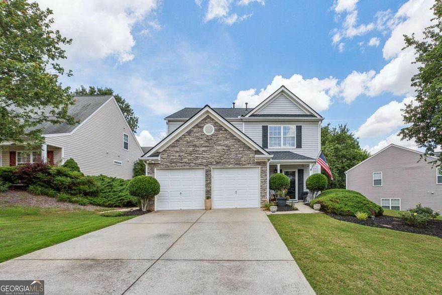 Don't miss this very well maintained traditional home in the highly sought after View at Holly Mill. This home has it all. Newer LVP flooring on both levels. Open floor plan with a great view of the family room from the kitchen. The lower level flows seamlessly between the eat-in kitchen, open concept dining area and family room centered around a fireplace. All three bedrooms are on the upper floor. The primary bedroom is very spacious, includes a walk-in closet and separate shower and soaking tub. Both secondary bedrooms are great for an office and/or gym. Newer HVAC and AC unit (2019), new roof (2018), new water heater (2018), new dishwasher (2019), new storm door (2018). Beautifully manicured front and backyard, private patio with a fenced in backyard oasis. Neighborhood amenities include swimming, tennis, basketball, playground and nature trails. Conveniently located minutes from I-575. Enjoy nearby shopping and dining off Holly Springs or Downtown Canton & Downtown Woodstock.