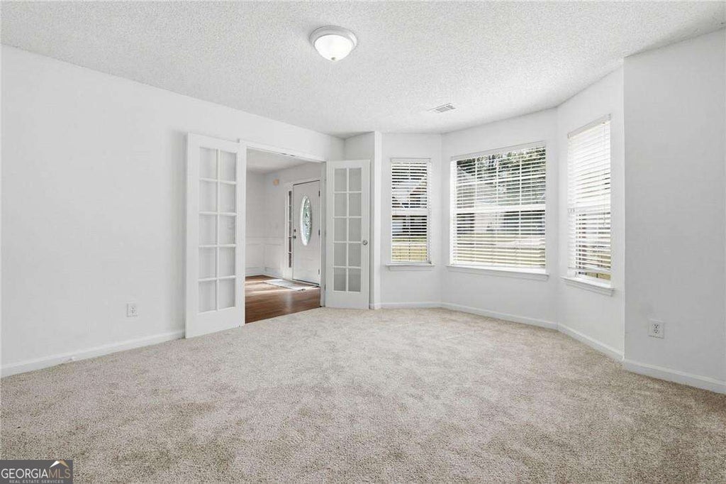 Photo of 645 Wildboar Court, Fairburn, GA 30213 (MLS # 10853049)
