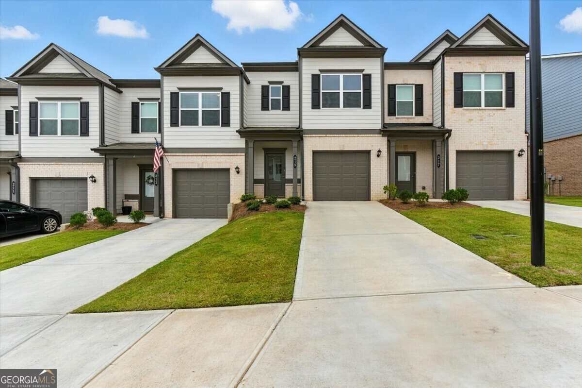 Welcome Home to this nearly-new townhouse built just one year ago! This home features vinyl plank flooring on the main level, an eat-in kitchen with abundant cabinet space, granite countertops, and stainless-steel appliances. Upstairs, you'll find a generous owner's suite with a large walk-in closet, an en-suite with double sinks, and a walk-in shower. Additionally, upstairs you'll find two spacious secondary bedrooms,and a large laundry room. Community amenities include a playground, and a dog park for your furry friends to feel at home too, PLUS weekly yard maintenance! Located just minutes to I-75, so commuting has never been easier, while still being close to shopping, dining, and Downtown Cartersville. Buyers - if you partner with our preferred Lender, Beth Southern with Direct Lenders you're eligible to receive up to 2% in closing cost assistance. Don't miss this move-in ready home in a prime location!
