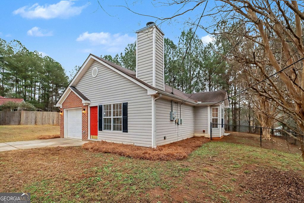 Photo of 6731 Browns Mill Trail, Lithonia, GA 30038 (MLS # 10654132)