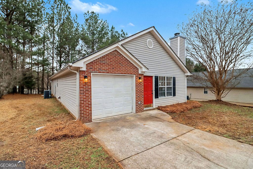 Photo of 6731 Browns Mill Trail, Lithonia, GA 30038 (MLS # 10654132)