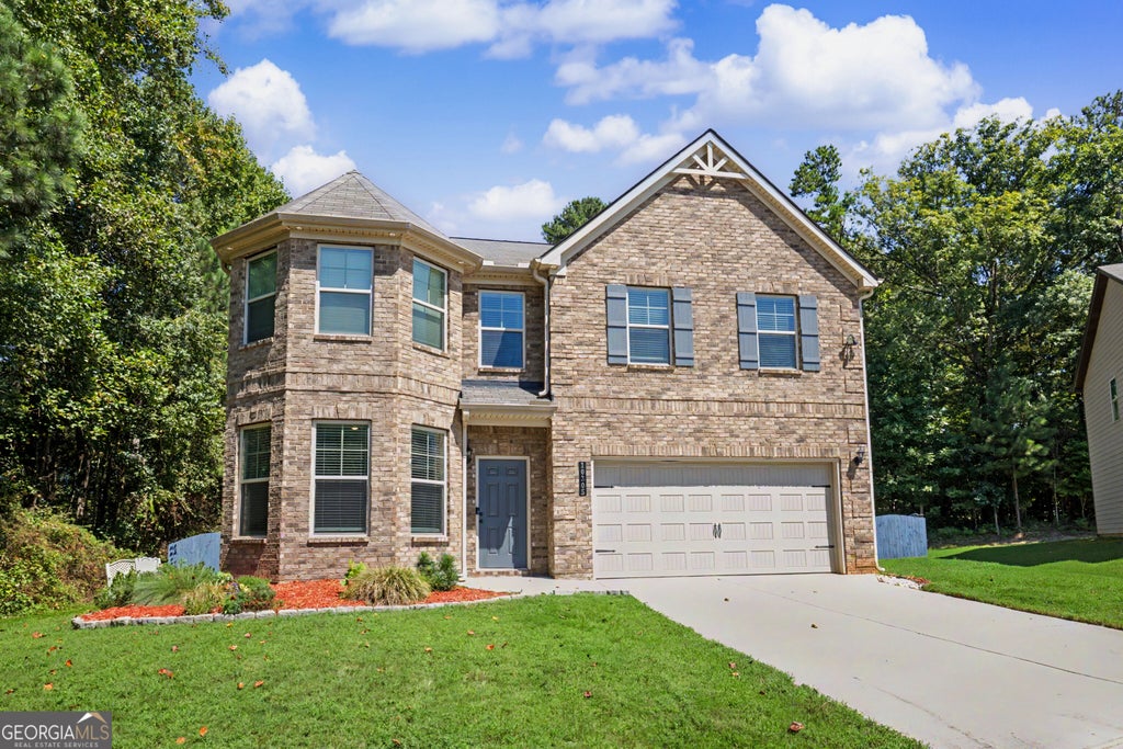 Photo of 10305 Cormac Street, Jonesboro, GA 30238 (MLS # 10848106)