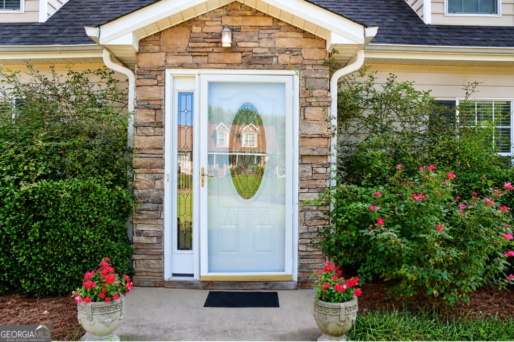 Photo of 40 Lake Charles Crossing, Covington, GA 30016 (MLS # 10799230)