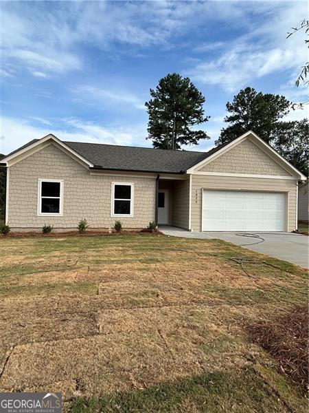 Discover Forkview - Your Path to Homeownership Starts Here! Eligible first-time buyers may receive up to $60,000 in financial assistance through Gwinnett Housing's Welcome Home Program. This is an incredible opportunity for your clients to secure a beautiful, brand-new home with significant affordability support. This home features an open-concept floor plan that welcomes natural light and creates a smooth flow between living, dining, and kitchen spaces. The kitchen is well-appointed with granite countertops, a large island, gray soft-close cabinets, and stainless steel appliances, including a glass-top stove, microwave, and dishwasher-ideal for everyday living and entertaining. All three bedrooms are on the main level, including a spacious primary suite with a walk-in closet and a granite-accented bathroom with a step-in shower. A secondary full bath and a laundry room add functionality. Interior highlights include modern light fixtures, ceiling fans, laminate and carpet flooring, and thoughtful finishes. . Exterior features include a covered front porch, back patio, and a two-car garage. The HOA-managed community offers energy-efficient construction and rental restrictions that promote long-term stability and pride of ownership. This home qualifies for the Welcome Home Program, offering up to $60,000 in subsidies for income-qualified, owner-occupant first-time homebuyers (must be at or below 80% AMI). Reach out for program details and to schedule a showing for your client. Let's get them on the path to homeownership at Forkview!