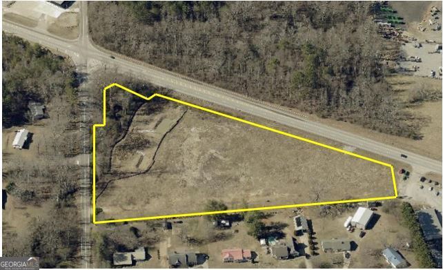This high-visibility corner lot offers an exceptional leasing opportunity along Cleveland Hwy, one of the most heavily traveled corridors in Clermont and Hall County. Located at the intersection of Holly Springs Rd and Cleveland Hwy, the site boasts dual road frontage, and strong traffic counts.