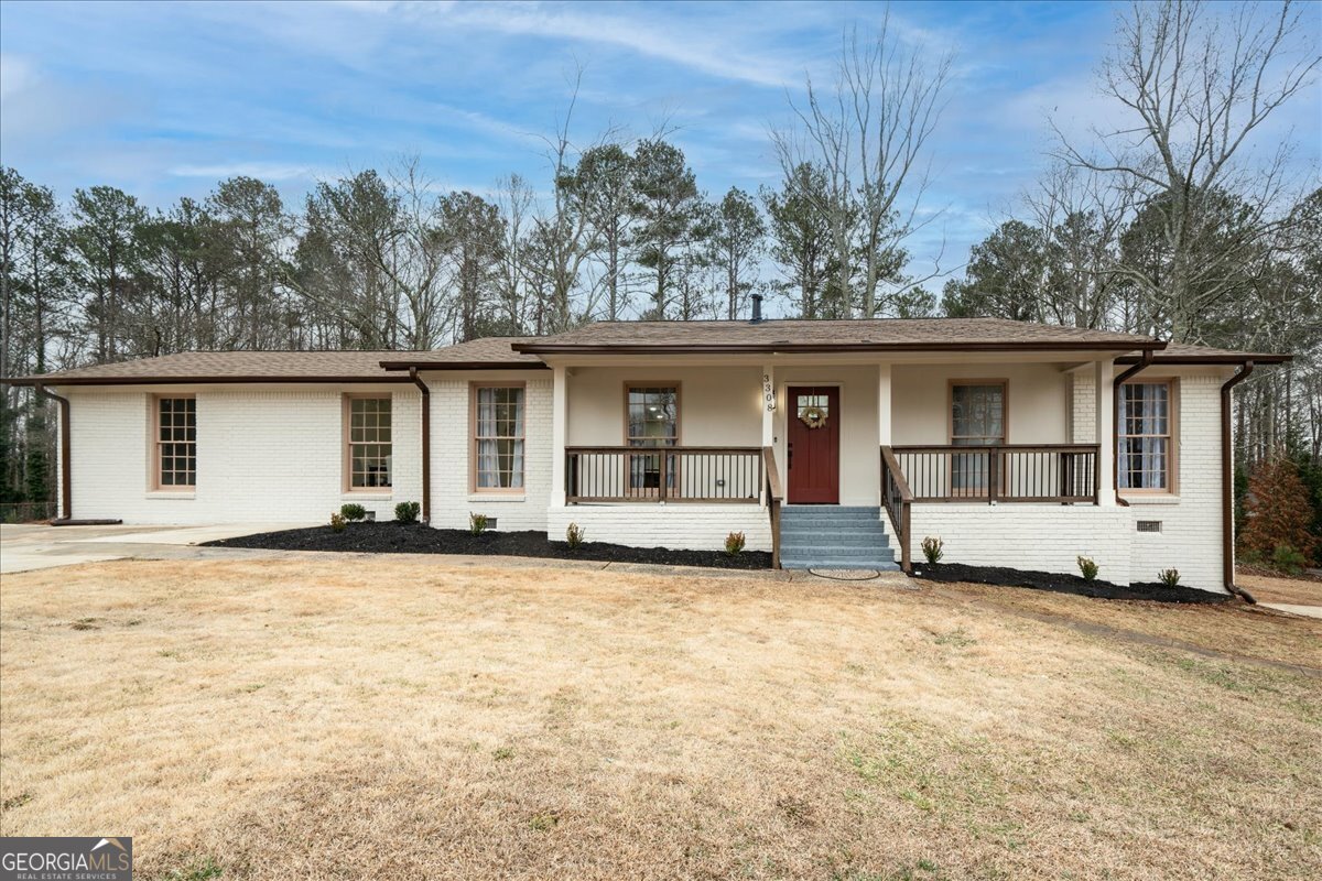 Exquisitely renovated and thoughtfully designed, this 3-bedroom, 2-bathroom ranch in Marietta offers the perfect blend of elegance and comfort. From the moment you arrive, the home's charm is undeniable, with fresh exterior paint, a new mailbox, and a meticulously cleaned yard that enhances its curb appeal. Inside, every detail has been elevated to reflect modern sophistication. The open-concept layout features brand-new LVT flooring, new carpet in designated areas, full interior paint, and an abundance of natural light that highlights the quality craftsmanship throughout. The gourmet kitchen is a showpiece, boasting quartz countertops, new appliances, stylish hardware, and custom lighting-ideal for both everyday living and entertaining. The spa-like primary suite includes a generous walk-in closet and a beautifully remodeled bathroom with a tiled walk-in shower, double quartz vanities, and sleek new fixtures. Secondary bedrooms are spacious and bright, with access to another fully renovated bathroom. Additional upgrades include new doors and trim, new vanities, light and plumbing fixtures, and a new water heater. Located near schools, shopping, and dining, this move-in ready Marietta gem offers a rare opportunity to own a home where refined design meets everyday comfort.