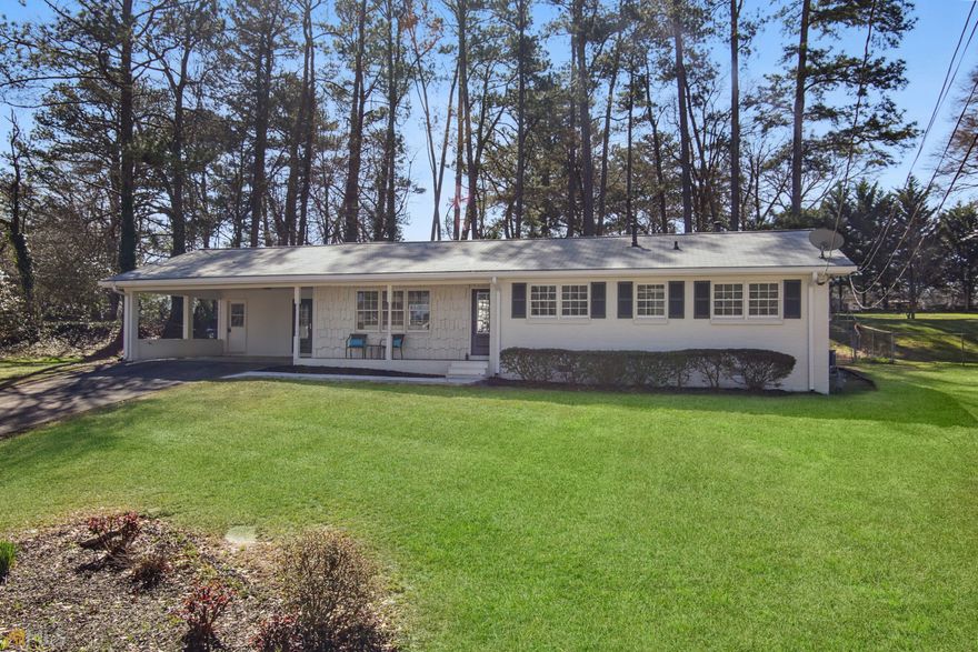 CANTON STREET is a short walk from the front door of this completely remodeled RANCH home. Enjoy one level living with a main level walkout to the backyard and patio. Open concept floor plan with a new kitchen includes Quartz countertops, kitchen island with seating for 4, new cabinets, floating shelves and a walk-in pantry. Four spacious bedrooms features a primary bedroom adjoining a large bathroom with double vanity featuring Quartz countertop and a linen closet. Two bedrooms share an adjoining bathroom complete with new vanity. Fourth bedroom features a sliding door which leads to the back patio and overlooks the backyard and is perfect for a home office or media room. Hardwood floors throughout this beautiful ranch home. The backyard offers privacy, additional storage in a metal shed, and a small building perfect for a "she shed", "play house" or garden room. Additional features include interior washer and dryer hook-up on main level, and a two car carport. A covered rocking chair front porch will greet you and welcome you home. No Home Owners Association (HOA) Ready for immediate move-in!