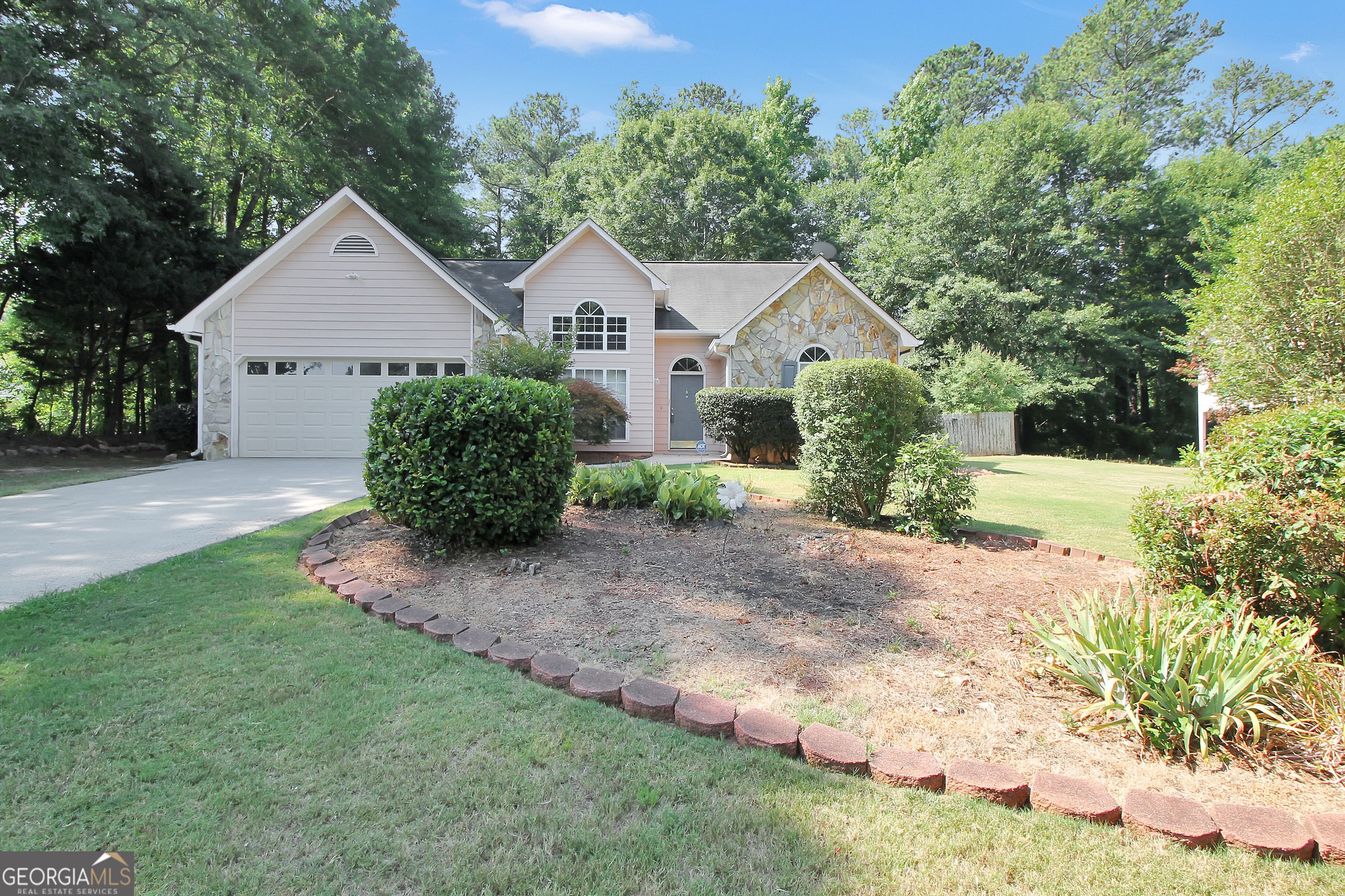 Cute as a button ranch in quiet McDonough community. Interior offers 3 roomy bedrooms and 2 full Bathrooms with split plan perfect for roommate situation, plenty of cabinets in kitchen, large family room and an attached 2 car garage. Relax on the peaceful and private screened back porch and enjoy the fenced back yard for your furry family members.