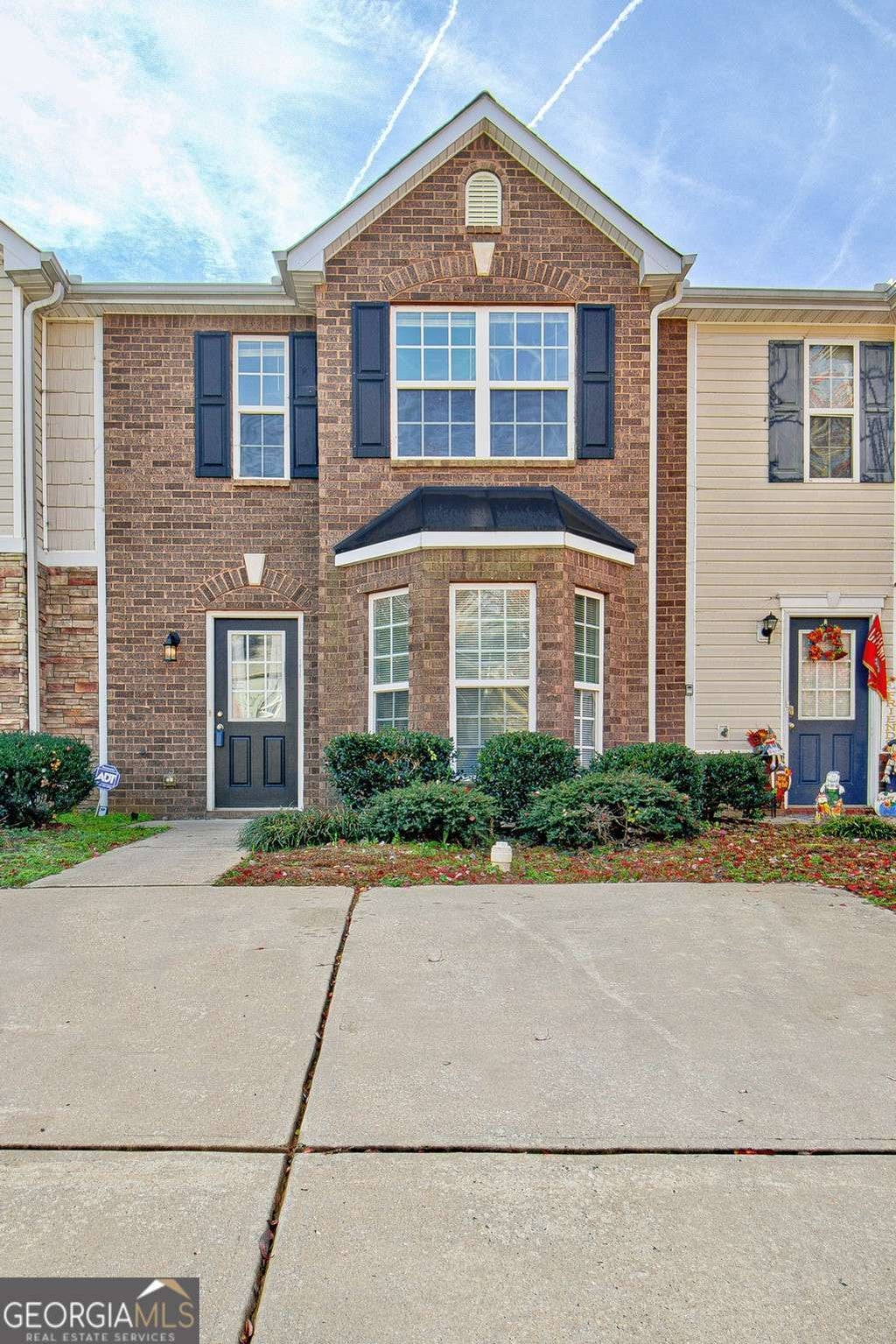 Photo of 1915 Grove Way, Hampton, GA 30228 (MLS # 10878569)