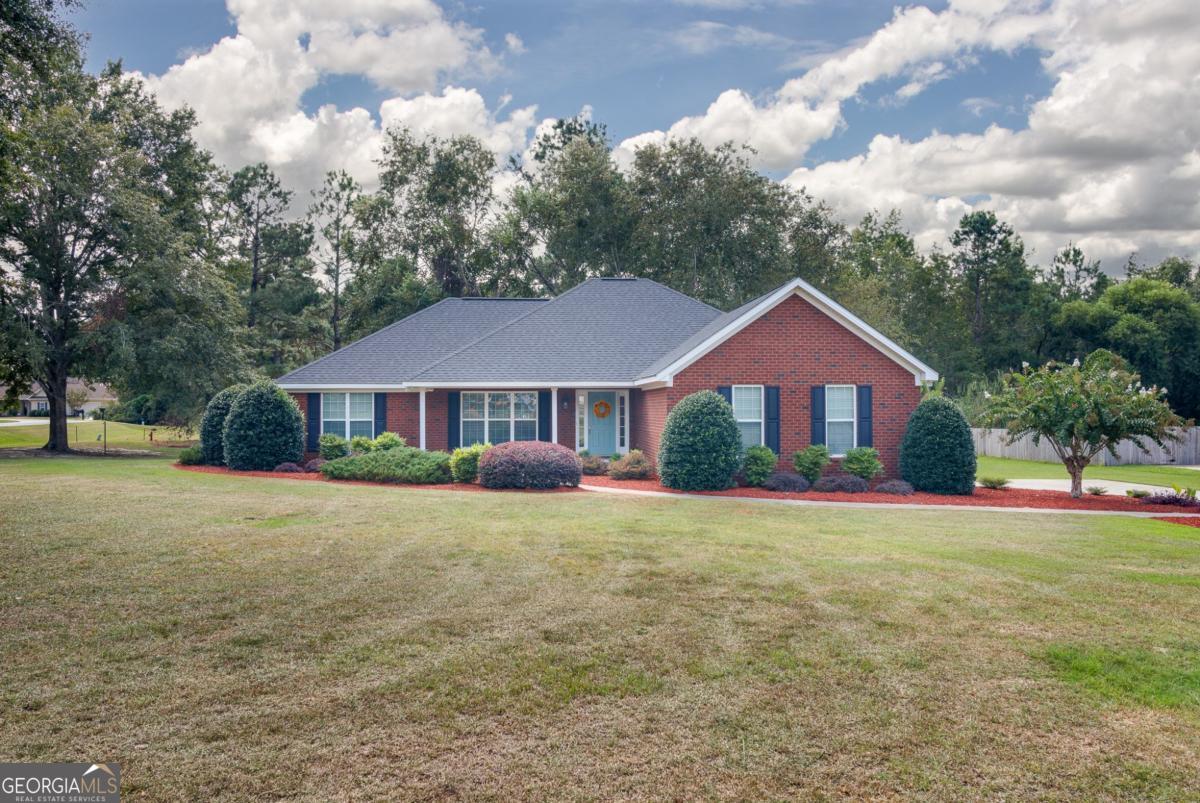 Impeccably maintained & move-in ready, make this brick, split 3BR/2BA on a 0.73ac corner lot in the quiet, no HOA Parkway Place neighborhood your new home! The house has LVP flooring in common areas, new carpet in bedrooms, ceiling fans, & 2" custom blinds throughout. The kitchen features an eat-at island with pendant lights, pantry & stainless-steel appliances. The living room has a vaulted ceiling & a gas log fireplace. The primary bedroom has a trey ceiling, custom tile walk-in shower, separate garden tub with tile surround, & double quartz vanity with undermounted sinks. The hall bath is updated with a granite countertop and undermounted sink. The home also features a newer roof (2021), new back deck, front porch, side-entry garage with automatic door, irrigation system, & a beautifully shaded back yard. Text or call today for your showing!
