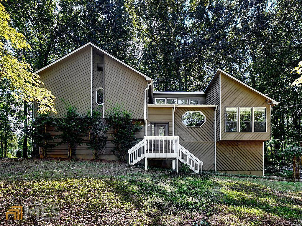 Large Private Wooded Lot with Small Stream, On Cul-De-Sac. Property Borders Corps of Engineers Land. Split Foyer Home. Main Level has a Spacious Living Room with Gas Log Fireplace, Dining Rm & Eat In Kit Open to LR. Great Lighting w Large Windows & SkyLights. Back Door Opens to Large Private Deck. Just a Few Steps Up From LR Hosts 3 Bed 2 Bath. Master Bath Has a Large Garden Tub, Hall Bath Has a Stand Up Shower. Basement Level Has Two Additional Large Rooms, Laundry Connections/Workshop Area. Large 2 Car Garage.This Home Would Make a Perfect Rental or Give an Owner an Opportunity to Make It Their Own. Excellent School District, Private Neighborhood and Wooded Lot, Close to Highways, Shopping, Dining. This Home Will Not Last In This Hot Market!