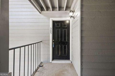 Photo of 305 Granville Court, Atlanta, GA 30328 (MLS # 10870142)