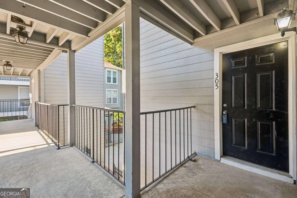 Photo of 305 Granville Court, Atlanta, GA 30328 (MLS # 10870142)