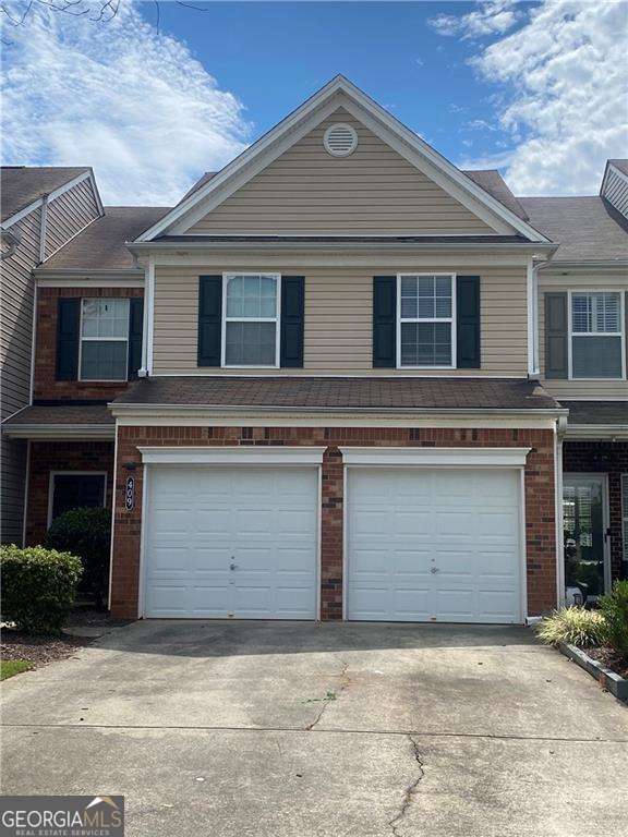 Welcome to your chance to own a beautifully updated townhome in the heart of Alpharetta! This 3BR, 2.5BA home offers a bright, open main living area with all bedrooms conveniently located upstairs. Nestled in a vibrant community featuring a pool, playground, lake, and green space, you'll enjoy easy access to GA-400, Marta, Halcyon, Vickery Village, Fowler Park, shopping, dining, and top-rated schools. Recent updates include new kitchen and primary bath countertops, sinks, and faucets, a newer microwave and washer, a brand-new roof (2024), new heat pump (2024), and HVAC (2021). Washer and dryer are included. Perfect for investors! This property is currently tenant-occupied through summer 2026 at $2,200/month. Buyer must honor the existing lease, providing immediate rental income in a highly sought-after area.