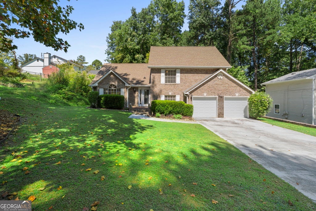 Photo of 2575 Ravencliff Road, Atlanta, GA 30349 (MLS # 10850120)