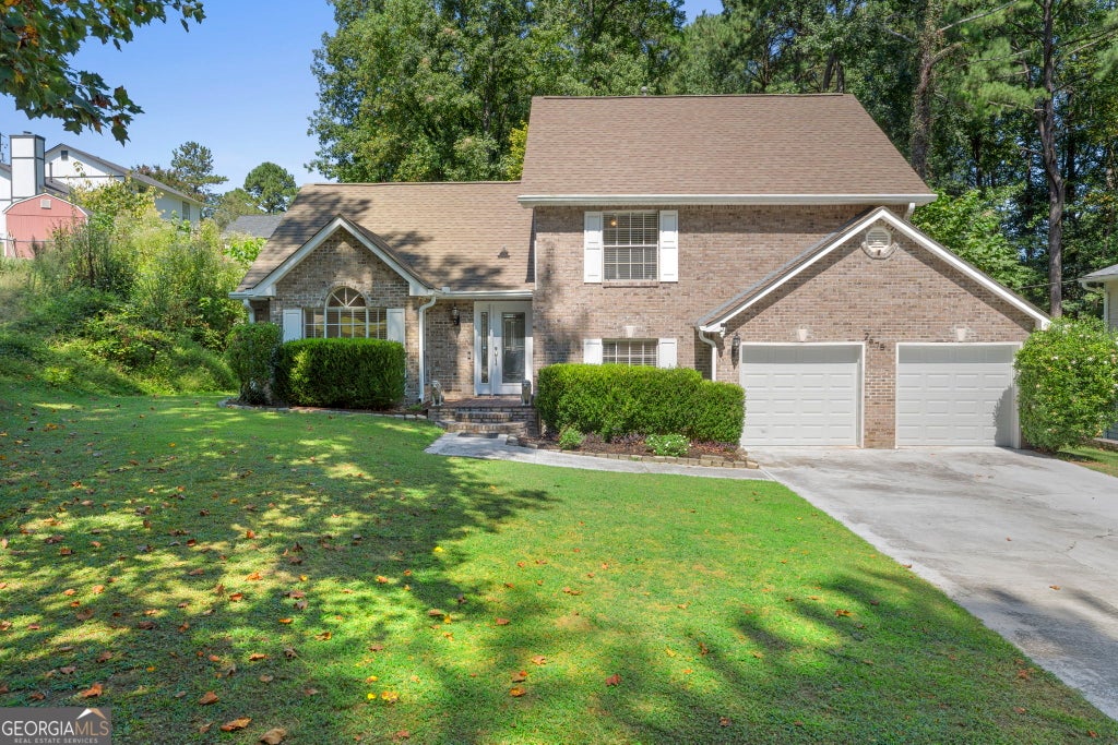Photo of 2575 Ravencliff Road, Atlanta, GA 30349 (MLS # 10850120)