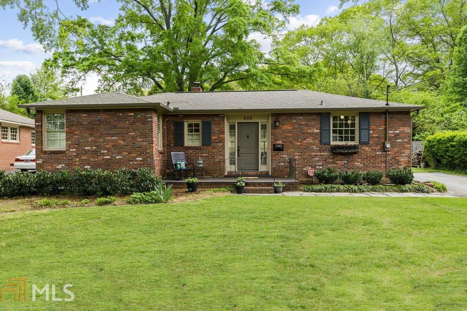 Impeccably maintained classic 4 sided brick ranch in sought after Historic Marietta! Walk in and look straight through the wall of windows to an oversized tranquil green backyard. Family room/dining room combo offer sunlight filled living space perfect for family and friends to gather in or spill out onto the patio for outdoor relaxing! Warm Pine hardwoods throughout, custom lighting and spacious bedrooms. Kitchen offers newer appliances, light colored cabinets, and granite countertops. Side entry off driveway for easy access into mudroom/laundry area leading to kitchen. Storage shed for workshop or tools, 3 year old AC with HEPA filter, thermostat controllable by phone, 4 year old roof, Plantation shutters on all windows (most newer), new water supply line from street to home, and 3 year old sump pump to keep things nice an dry! Walk, ride or roll to the charming Marietta Square for the Marietta Farmers market, Friday night concerts, art shows, festivals, restaurants and shops!