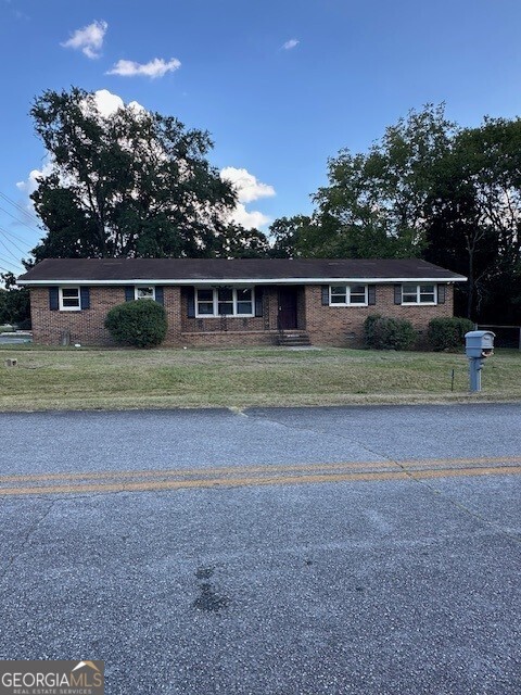 Location, location, location.... This charming, all brick, home has it all. Enjoy brand-new kitchen countertops, fresh interior paint, and all-new flooring throughout. Situated on a great corner lot. Perfect home for your family to relax and, with the convenient location, to quickly get to all places Macon has to offer. AND... don't forget the added benefit of Jones County Schools.
