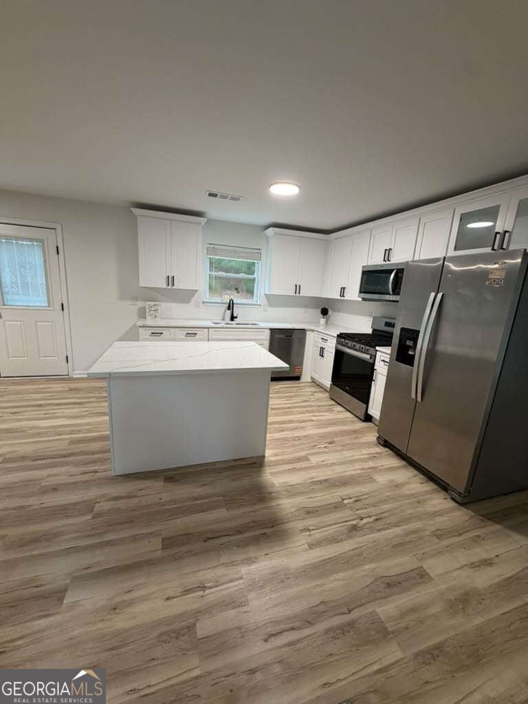 Photo of 320 Oxnard Circle SW, Atlanta, GA 30331 (MLS # 10874444)