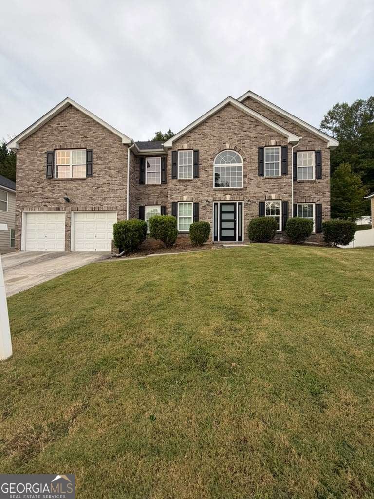 Photo of 320 Oxnard Circle SW, Atlanta, GA 30331 (MLS # 10874444)
