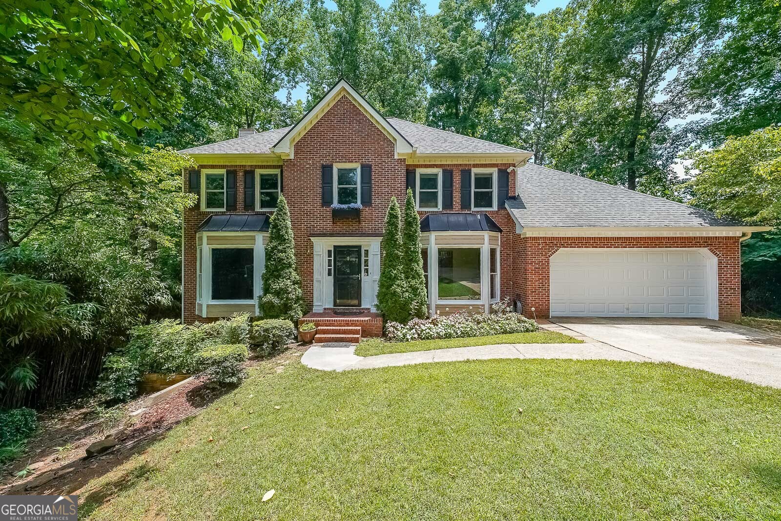 Discover this East Cobb Sweetheart, Lassiter School district, fantastic location with Sweat Mountain Park nearby, Cul-de-sac lot, Brick home with expanded Trex deck, finished basement walks out to large patio overlooking private backyard. Inside the home has new flooring both on main and upper level and fresh paint, newer HVAC and tankless water heater and so much more.