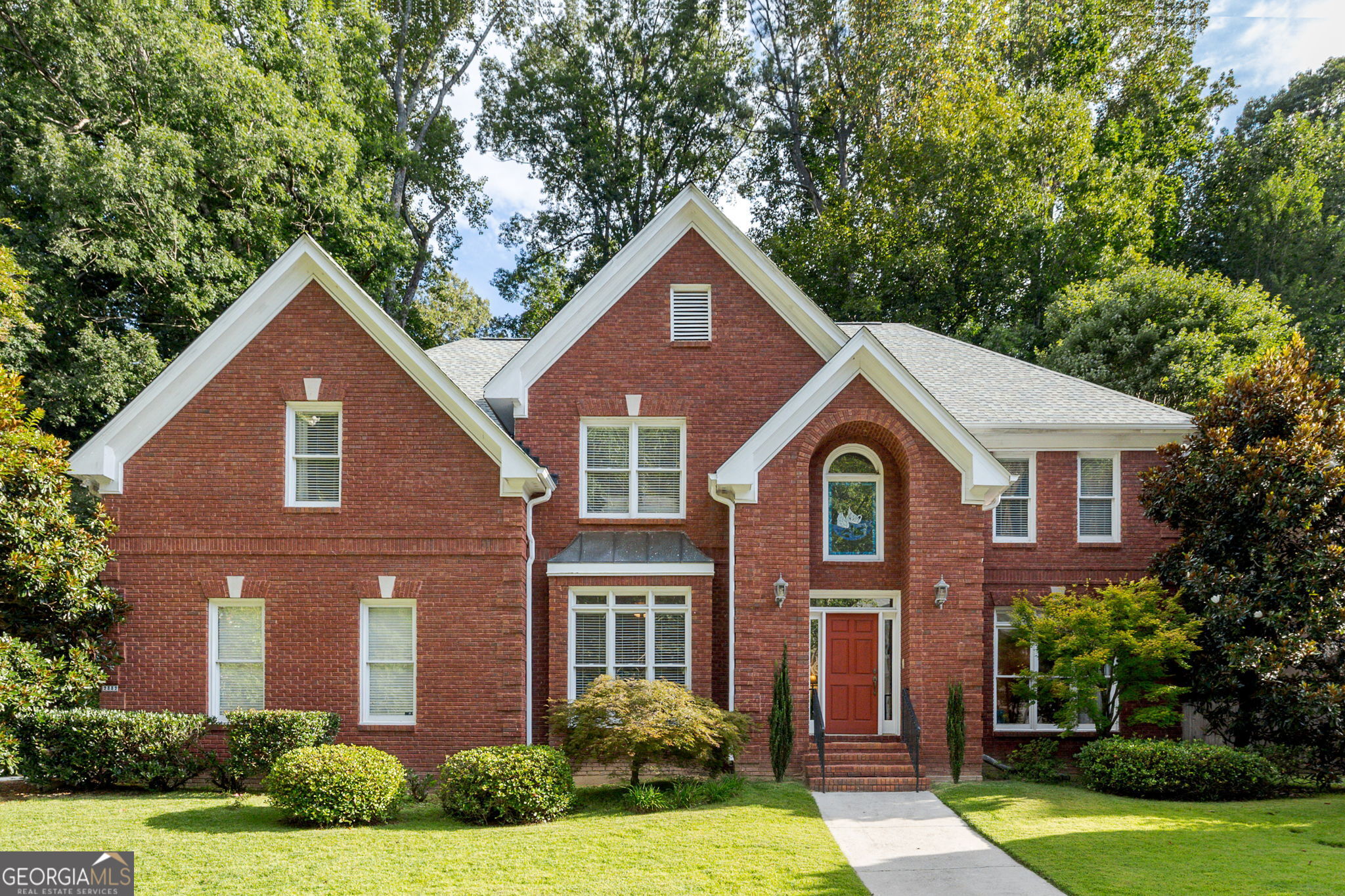 Welcome to this stately all-brick traditional home nestled on a quiet cul-de-sac street in the highly sought-after Oak Grove neighborhood. Step into the beautiful two-story foyer featuring hardwood floors on main level, a bright and open floor plan and wonderful space throughout! The main level offers multiple living spaces including a formal dining room, living room, bedroom with full bath, large fireside family room open to expansive kitchen with loads of cabinet and counter space, center island with gas cooktop, and a large eat-in kitchen. Off the kitchen and great room is a wonderful private backyard with a large deck and loads of outdoor space ideal for grilling out and entertaining family and friends! Upstairs includes upgraded hardwood floors in the primary bedroom with a large ensuite bath and wonderful walk-in closet. Three additional bedrooms plus bonus room up including two with a shared bath, a third bedroom with ensuite bath, and a huge bonus room that would make an excellent media room, rec room, teen suite, or additional bedroom. The home has been meticulously maintained featuring a brand new roof, newer HVAC units, refinished hardwoods, and an ideal layout allowing for the buyer to make the space their own! Excellent neighborhood and fantastic Oak Grove location minutes to shopping, schools, restaurants, and so much more!