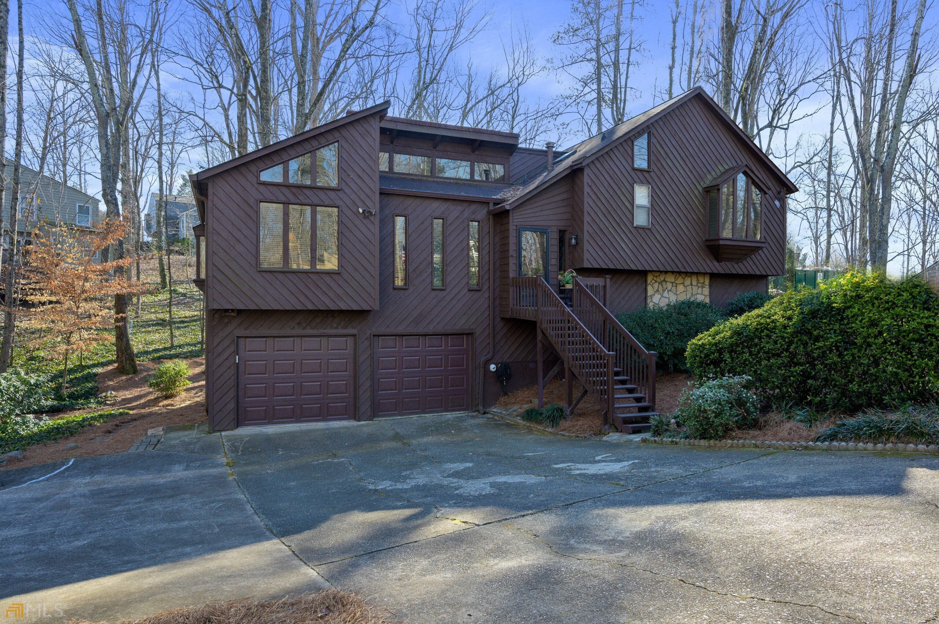 Welcome home! This beauty is located in a sought after area close to shopping, restaurants, grocery stores. You will feel welcome once you pull up in the cul-de-sac and see all the privacy that surrounds this home. Step inside and sit a while in the oversized family room which leads into a huge gathering room/dining room. The office area is perfect for those zoom calls and quiet. In the lower level, there is a media/family room and a 4th bedroom. Step in the back area and you will be surprised by the screened porch and the peace and quiet that surrounds the property. This beauty has everything you have been looking for. Do not delay!