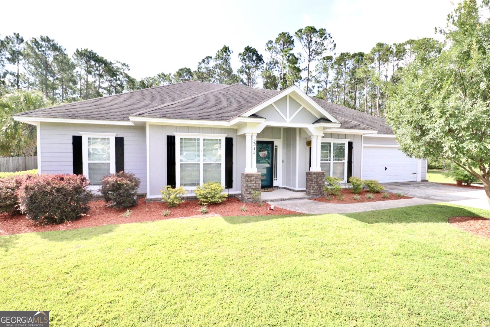 Stunning 4BR/3.5BA on over 1/2 acre lot in cul de sac w/ in ground pool. Home has 2 master bed/bath. Open/split floorplan with office, sunroom & separate 24x18 wired workshop. Large fenced backyard with pergola seating and no rear neighbors! Kitchen has bar seating, SS appliances and coffee bar w/ 2 pantries. Custom tea stained cabinets & travertine backsplash w/ mosaic tile accent. Ample natural light makes this beautiful home inviting! Sunroom has wet bar w/ fridge & granite counters & pool bath. Master bath has separate garden tub & shower with built in make up vanity & walk in closet. 2nd master has private bathroom w/ shower & walk in closet. Gorgeous hand scraped wood floors in main areas, tile in kitchen, bathrooms & sunroom. Oversized dining/breakfast area & large laundry room w/ broom closet. AMAZING outdoor living for entertaining or a private getaway.