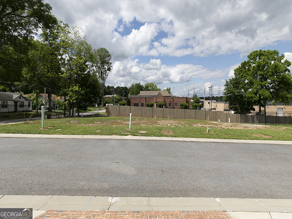 Don't miss this rare opportunity to own four ready to build townhome lots in one of Marietta's most vibrant and walkable neighborhoods! Just a short stroll to the Marietta Square, these lots are perfectly positioned near shopping, dining and public transportation in an established townhome community.