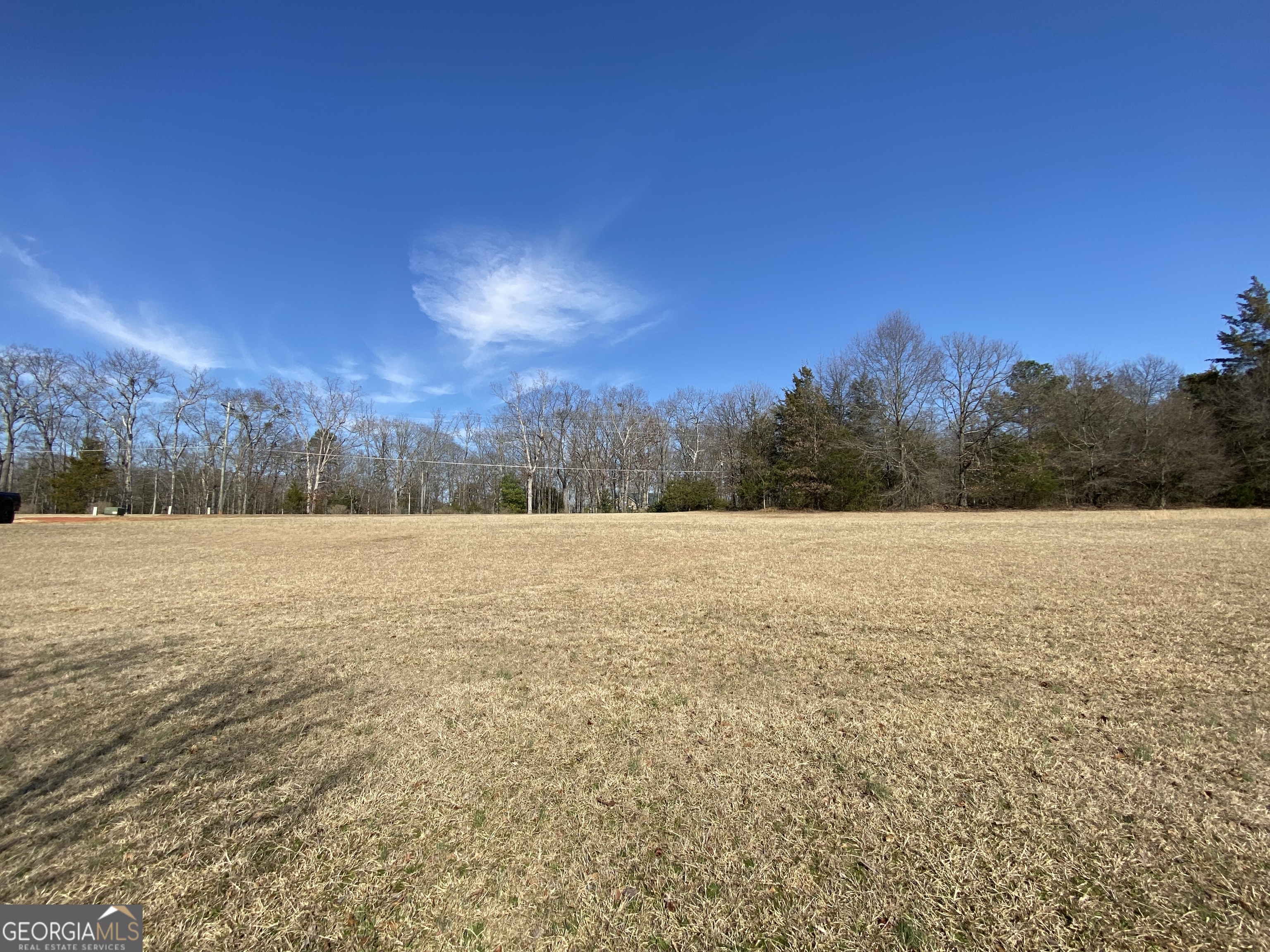 Majestic Shores is an upscale subdivision of newer homes in the sought-after Carter's Ferry area of the lake. You will have easy access to shopping and restaurants in the town of Hartwell. Lakefront and interior lots are available. The lakefront lots have private docks in place and each interior lot includes a private covered slip in the community dock. All of the lots have easy build sites and some are already cleared. The developer is also offering lot/build packages. Lot 12 is .55 acre in size.
