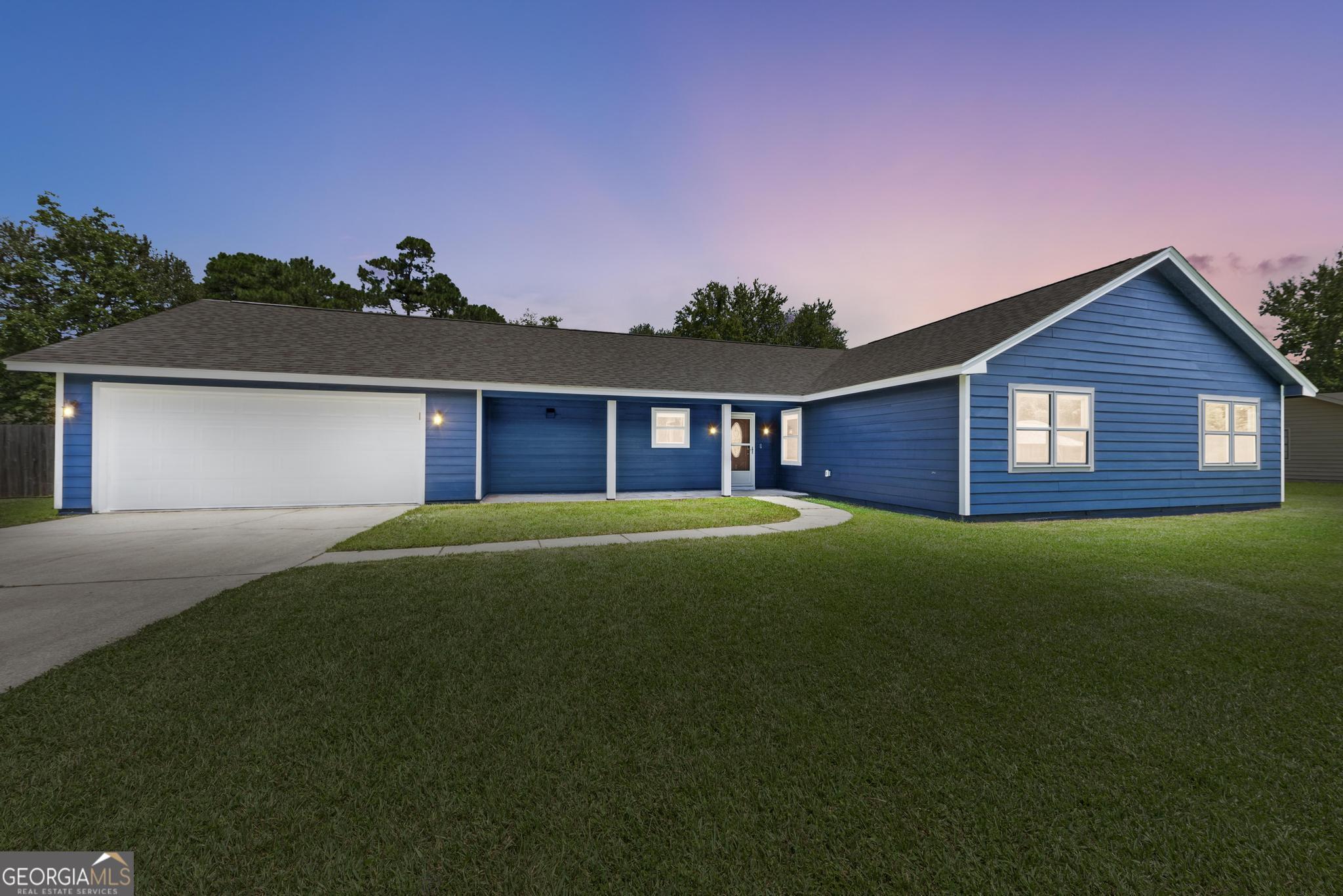 IMMACULATE ranch styled 4 bedroom/2 bathroom home with a rocking chair front porch, in Mallard Pt off of Harrietts Bluff! Come on in to the foyer where you are met with wonderful natural lighting overlooking the living room! Living room has vaulted beamed ceilings with recessed lighting and your first floor to ceiling stone wood burning fireplace! HUGE KITCHEN with an island, gas stove, doubled door oven, pantry and stainless steel appliances! Immense amount of storage in the kitchen! Second stone wood burning fireplace is located in the kitchen/dining area backing up to the other one in the living room! Just off the kitchen you have a big laundry room with plenty of shelving! Primary suite has a gorgeous barn door leading into the primary bathroom  which offers a double vanity, walk in closet, and a tub/shower combo.  Big fenced in backyard with two out buildings, a fire pit, double gate as well as a great sized screened in back porch!  Just shy of 2,000 Sqft! This home has been fully remodeled! New interior and exterior paint one the back sheds has also been painted to match! Roof is just 8 years new! All windows have been replaced! NO CARPET! NO CITY TAXES! Flood insurance is not required! Schedule your showing today!!!