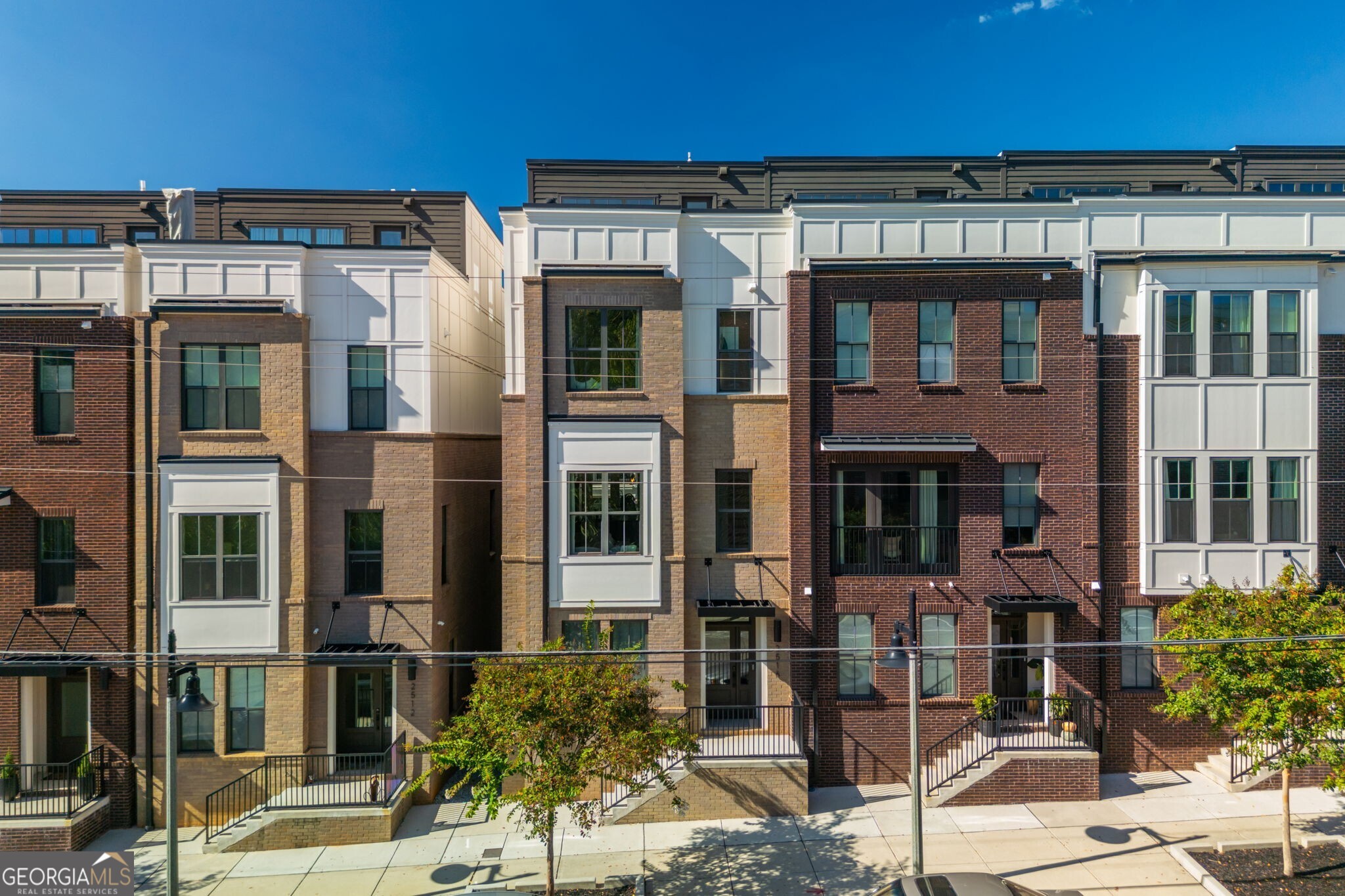 2516 Talley Street offers an ideal turnkey luxury lifestyle in the heart of the vibrant City of Decatur. This end-unit townhome, newly built in 2024 by the renowned Toll Brothers, features four levels of high-end finishes, abundant natural light, and a showstopping rooftop deck. The kitchen boasts an oversized island, premium appliances, and generous counter space perfect for cooking, entertaining, and gathering with friends. A unique highlight is the oversized garage, designed to accommodate a car lift for those who collect or showcase vehicles. The home's thoughtful layout includes four spacious bedrooms, dedicated office space, a butler's pantry, back deck, and an open-concept living area that blends comfort and sophistication. Ideally located near the new Talley Street Elementary School and within walking distance of Downtown Decatur's acclaimed Michelin-rated restaurants, this residence is surrounded by award-winning schools, celebrated eateries, and the lively charm that defines Decatur living. Built by an award-winning builder in one of Atlanta's most desirable communities, 2516 Talley Street delivers the ultimate in modern, turnkey luxury living.