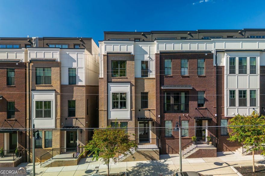 2516 Talley Street offers an ideal turnkey luxury lifestyle in the heart of the vibrant City of Decatur. This end-unit townhome, newly built in 2024 by the renowned Toll Brothers, features four levels of high-end finishes, abundant natural light, and a showstopping rooftop deck. The kitchen boasts an oversized island, premium appliances, and generous counter space   perfect for cooking, entertaining, and gathering with friends. A unique highlight is the oversized garage, designed to accommodate a car lift for those who collect or showcase vehicles. The home's thoughtful layout includes four spacious bedrooms, dedicated office space, a butler's pantry, back deck, and an open-concept living area that blends comfort and sophistication. Ideally located near the new Talley Street Elementary School and within walking distance of Downtown Decatur's acclaimed Michelin-rated restaurants, this residence is surrounded by award-winning schools, celebrated eateries, and the lively charm that defines Decatur living. Built by an award-winning builder in one of Atlanta's most desirable communities, 2516 Talley Street delivers the ultimate in modern, turnkey luxury living.