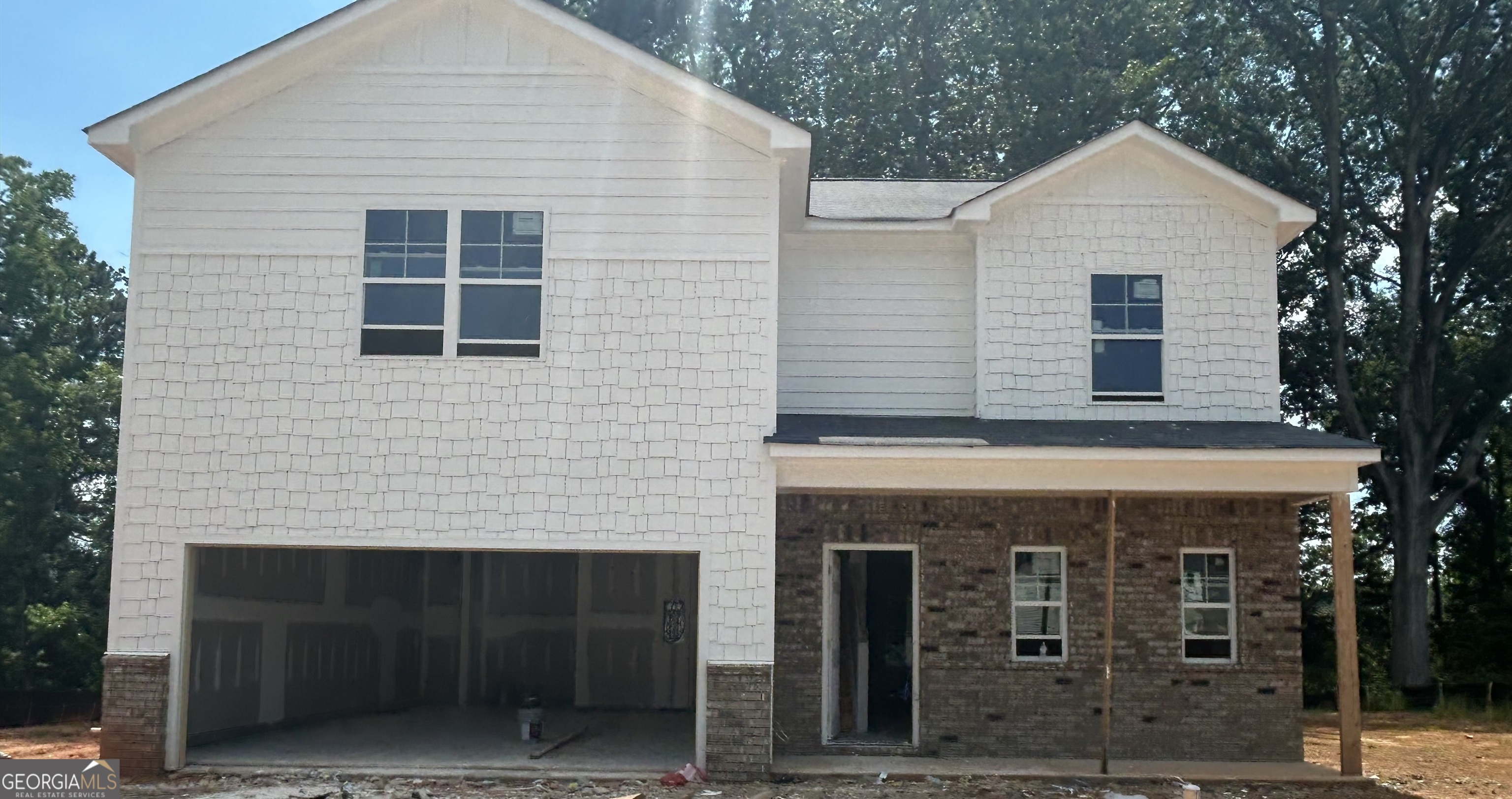 Homesite 2. Welcome to The Linden by Kerley Family Homes-- Estimated Completion September 2025. Photos are of a previously built home with the same floor plan. Nestled in Sweetlake Grove, our desirable Bungalow Series, this stunning home is everything you've been waiting for! Offering 2,032 sq. ft. of beautifully designed living space, this home includes our Move-In Ready Bundle at no extra cost, featuring a refrigerator, washer, dryer, and whole-house blinds. Move in with ease-everything you need is already included! The Linden plan is perfect for those who enjoy open-concept living. The main floor boasts a great foyer area with a powder bath, coat closet and access to the spacious two-car garage. A spacious kitchen with a large center island, sleek stainless-steel sink, and gorgeous upgraded granite countertops. Painted cabinets with stylish hardware and cabinet crown molding , a beautiful tile backsplash, and a walk-in pantry make this kitchen both functional and stylish. Whirlpool stainless steel appliances, including a gas range, dishwasher and microwave. You'll love the abundance of natural light pouring in through the large windows in the family and dining areas. Off the family room, a full-light patio door leads to a relaxing 10x12 Covered Patio complete with a ceiling fan leading to a 12x24 Deck Great place to grill, relax and take in the beauty of a private wooded backyard space. Upstairs, a luxurious Primary Suite with an expansive walk-in closet, ensuring you have plenty of space for your wardrobe, double vanity and beautiful tile flooring. Three spacious additional bedrooms, one with a walk-in closet, a full bath with double sinks provide comfort and privacy. Finishing up the 2nd floor is a nice size laundry room with a window and washer and dryer to add a bit of convenience. As part of our "Save Your Way with Kerley Family Homes" promotion, you can enjoy up to $7,500 in savings, which can be applied toward closing costs, rate buydowns, or design options. Conveniently located with easy access to I-20, I-75, and the East-West Connector, you'll be just minutes from historic Downtown Marietta, Truist Park/The Battery, Mable House Amphitheatre, Cumberland Mall, Vinings, Smyrna, and a variety of shopping and dining options. Our new Bungalow Community offers homesites ranging from 1/2 acre to 3/4 acre, providing plenty of space and privacy. Each home comes with a builder's warranty and the installation of an in-wall Pestban system for peace of mind.. Don't miss out on this incredible opportunity! Contact our sales team today to schedule an appointment and see how The Linden can be your perfect new home. Pictures displayed are of a the same floor plan, but are not pictures of the exact home listed. Builder Incentive of $7,500 must use preferred lender for incentive.