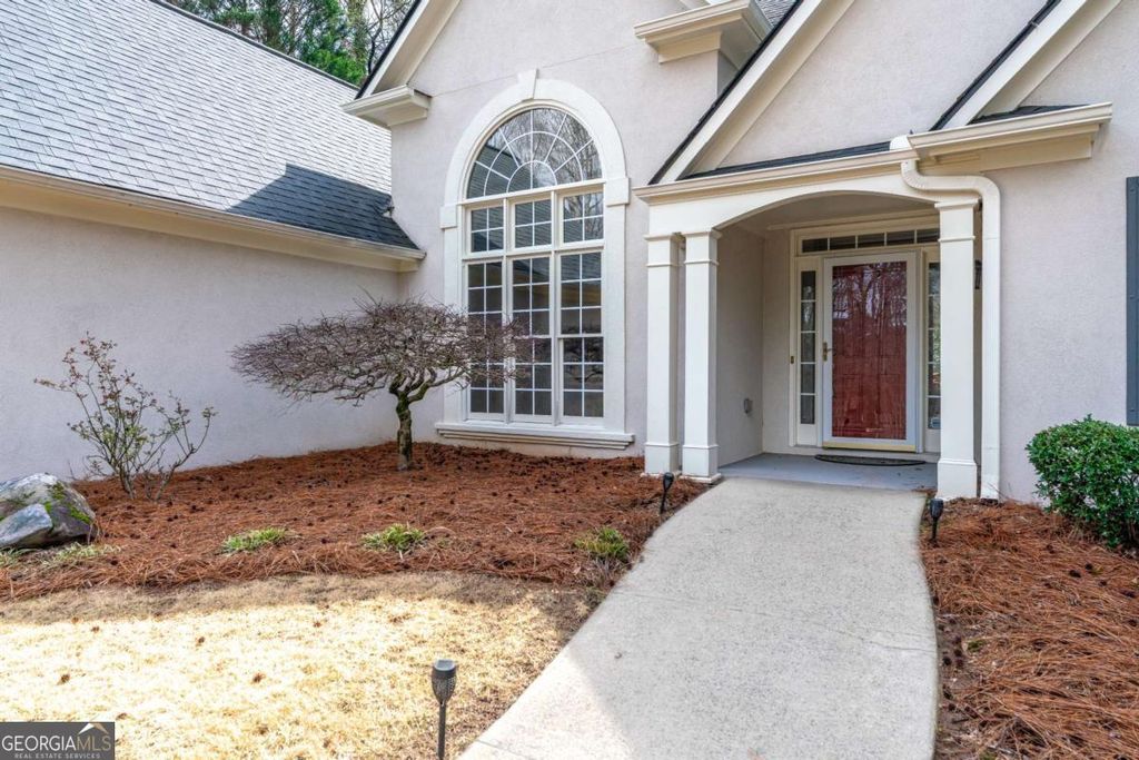 Photo of 7050 Red Fox Lane, Cumming, GA 30040 (MLS # 10708500)