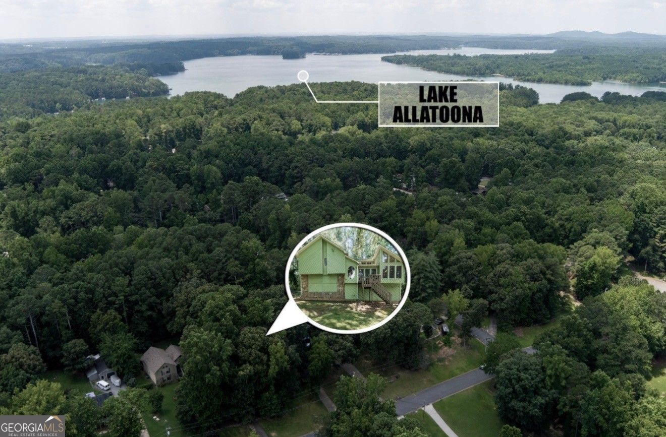 Welcome Home to 314 Bethel Drive Where Comfort Meets Community!Tucked away in a friendly swim/tennis neighborhood, this charming Woodstock home offers the perfect mix of space, warmth, and convenience. Just a short drive/golf cart drive to Lake Allatoona, Sunset Grille, Victoria Marina, JD's on the Lake, and Little River Marina-you'll love being so close to the water, dining, and fun! Step inside to an open, airy floor plan with a vaulted family room that feels bright and welcoming. The updated kitchen flows right into the dining room, making it easy to gather with family and friends. With 4 spacious bedrooms and 3 full bathrooms, there's room for everyone to feel right at home. Outside, the multi-level back deck is perfect for summer cookouts or quiet mornings with coffee. The fenced backyard gives you privacy and plenty of space to play, garden, or just relax. There's even a workshop and a bar area in the garage-ideal for weekend projects or hosting game day. From the friendly neighbors to the unbeatable Woodstock location, 314 Bethel Drive is more than just a house-it's a place to call home.