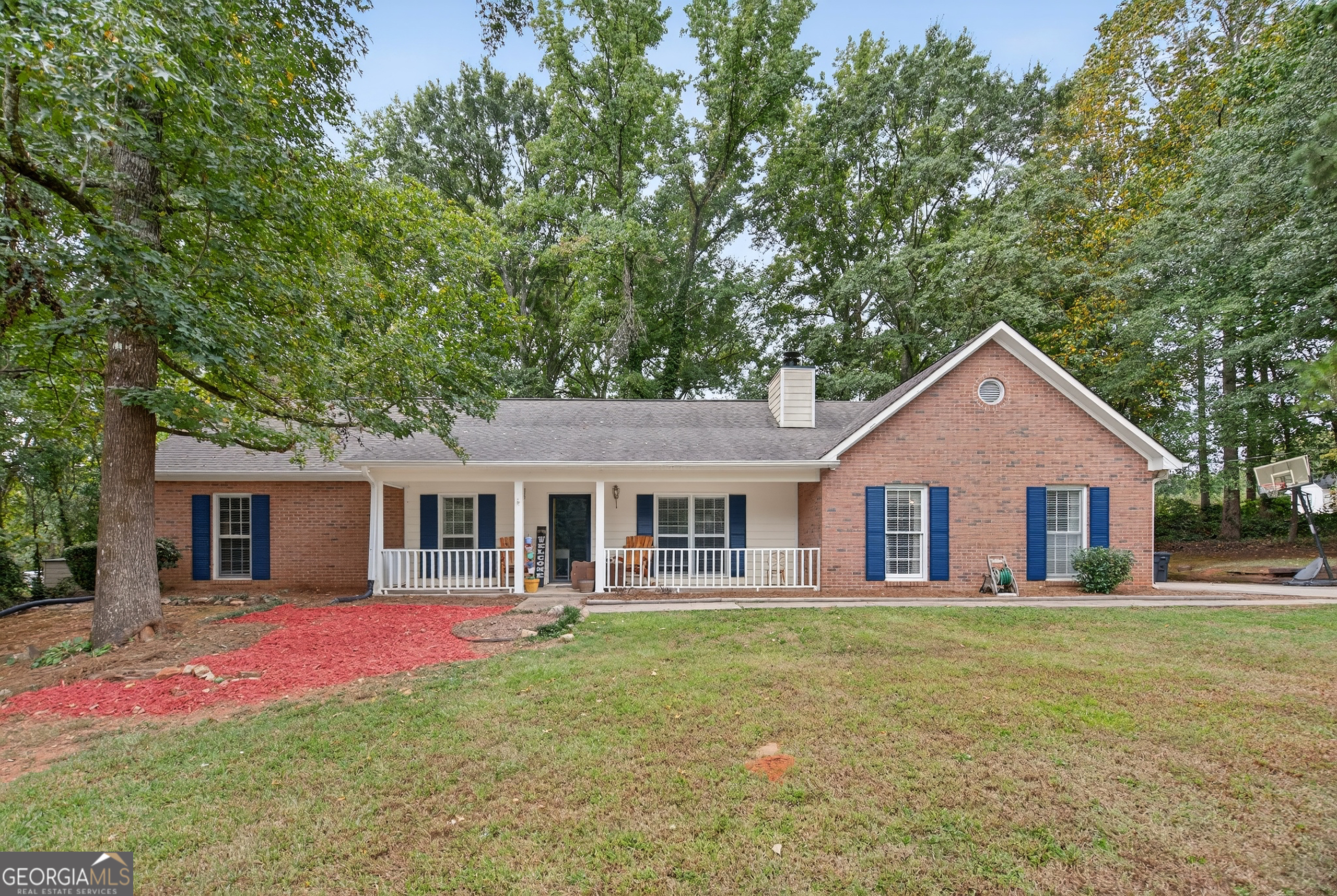 RETIRE YOUR HOUSE HUNTING SHOES! Welcome home to this beautifully maintained single-level gem in the highly sought-after Rockwell Estates community. Featuring 3 bedrooms and 2 full baths, this thoughtfully designed residence combines comfort, style, and functionality. The updated eat-in kitchen showcases solid surface stone countertops and abundant cabinetry, opening into a spacious, flowing floorplan accented by wide plank LIFE Proof LVP flooring throughout the common areas-perfectly tailored for family living and entertaining. The primary suite is a true retreat with a spa-like ensuite bath boasting a custom tile shower and generous closet space. A gigantic additional family room creates the ultimate gathering space for college game day or family game night. Nestled on a very private, level lot, this home is ideally located just a stone's throw from the pristine shores of West Point Lake, with multiple public parks nearby for endless outdoor enjoyment. Recent updates include a new roof, septic system, and fresh paint throughout-making this one truly move-in ready!