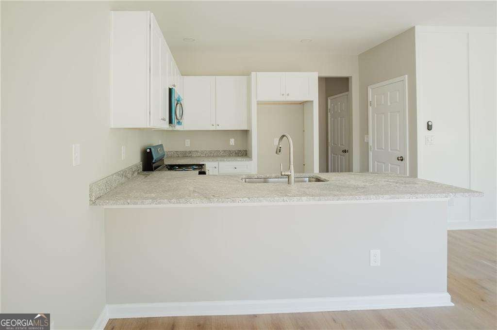 Photo of 112 Neal Avenue, Stockbridge, GA 30281 (MLS # 10805674)