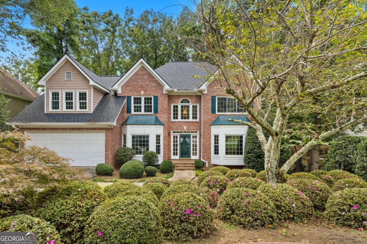 Huge opportunity to own a wonderful home in Johns Creek- the #1 rated city in America! This cul-de-sac home is located in Amenity rich Huntington- part of the Shakerag community. Within walking distance to the new Cauley Creek park! Recent upgrades to this home: NEW INTERIOR PAINT, REFINISHED HARDWOODS,NEW DECK, NEW CARPET UPSTAIRS, AND FLOORING IN THE PRIMARY BATH AND LAUNDRY. Featuring large living spaces on the main floor- including, family room with bookcases, a large living room, as well as a lovely sunroom. Upstairs are 4 large bedrooms, 3 full baths! One bedroom has a private bath. The basement is ready to be finished, doubling the square footage! Top North Fulton schools, close to shopping and dining, as well as the new Medley entertainment district- slated to open in 2026! Ready to call Johns Creek home? Come see this lovely home today!