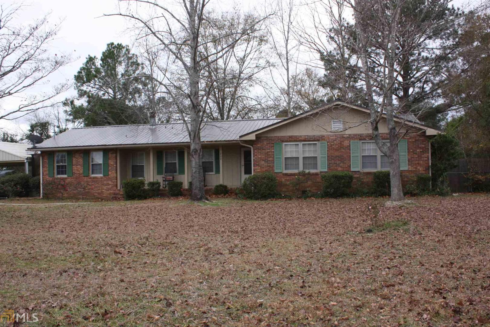 Wonderful large home in town. 3 bedroom 3 bath home offering a huge living area with sun room bonus Man / She cave. Master has custom built walk in closet and updated bath. Fenced back yard with storage shed. Minutes to shopping and restaurants.