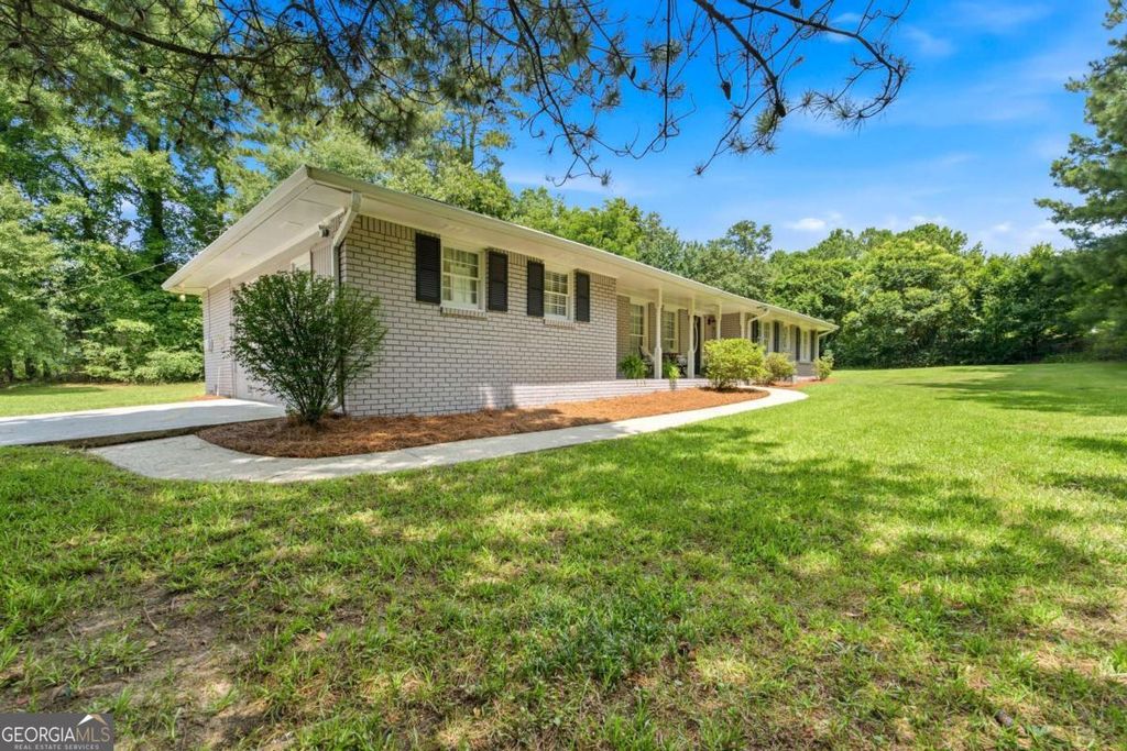 Photo of 2447 Lenora Church Road, Snellville, GA 30078 (MLS # 10801317)