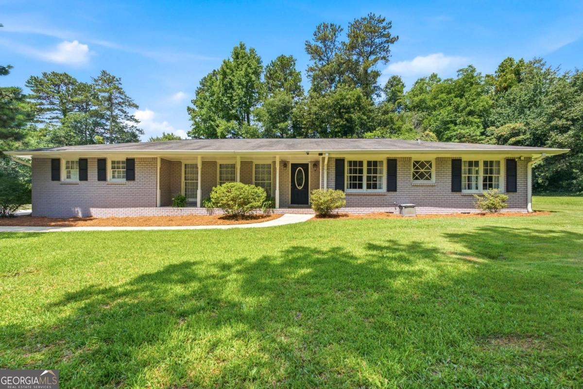 Photo 1 of 25 — 2447 Lenora Church RD, Snellville, GA 30078
