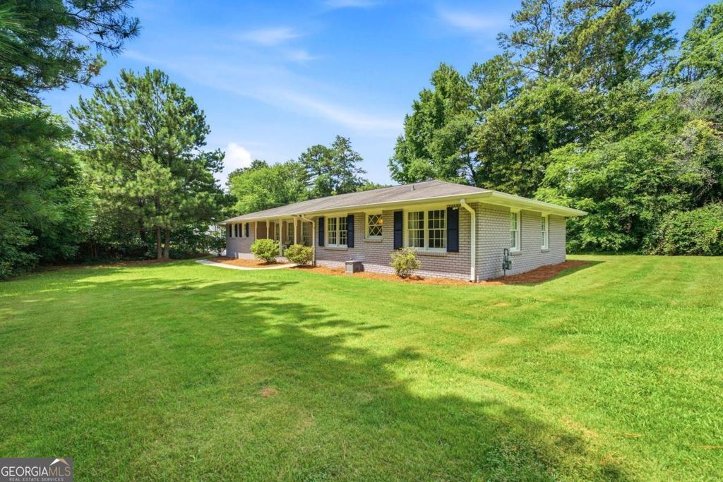 Photo of 2447 Lenora Church Road, Snellville, GA 30078 (MLS # 10801317)