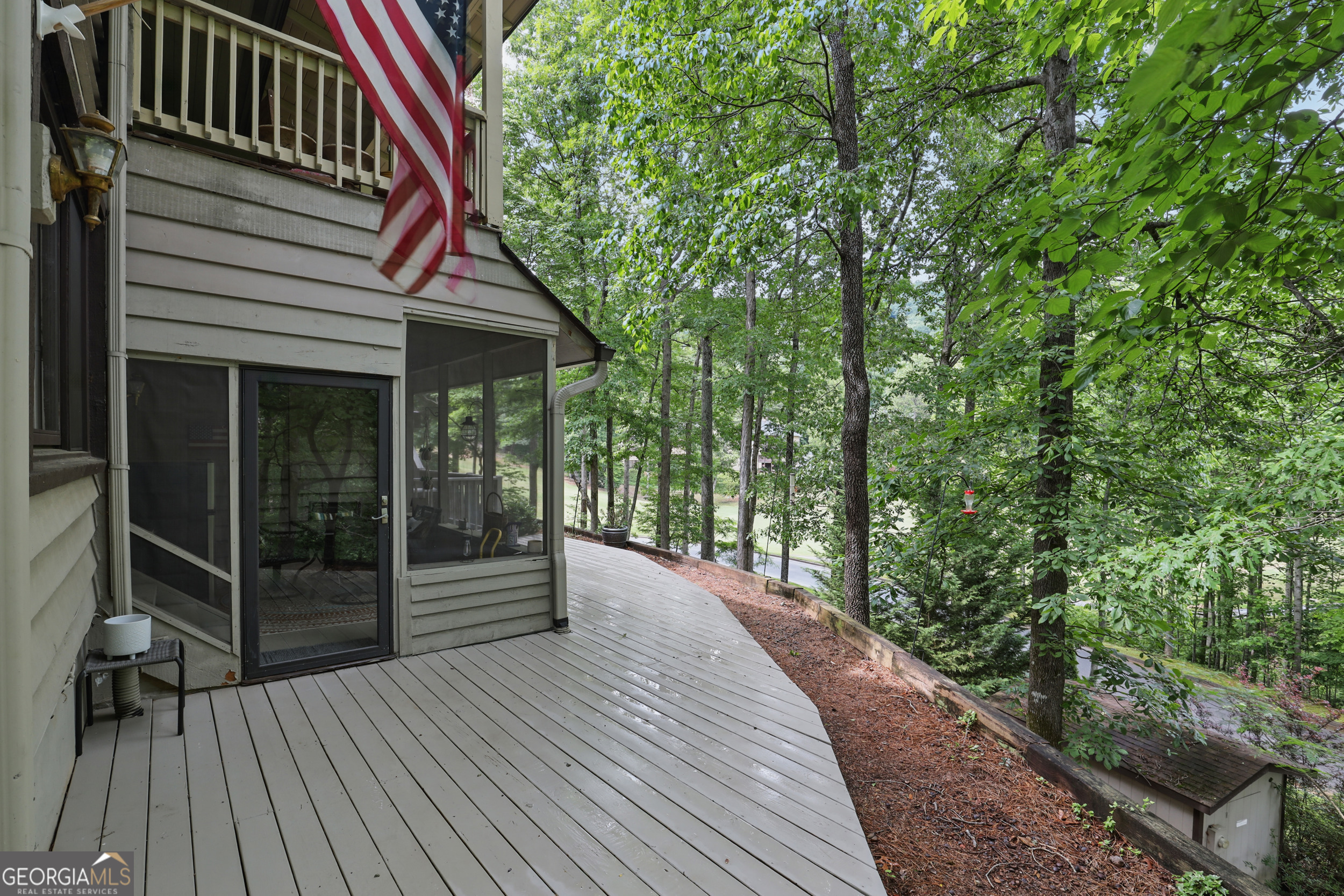 $5,000 in Concessions being offered with an Acceptable Contract!!! Welcome to your RARE ground-level corner unit in Kings Point at the prestigious Kingwood Golf & Winery Resort-an ideal investment property, vacation retreat, or full-time residence in the heart of the beautiful North Georgia Mountains! This completely remodeled condo (2021) features two generously sized bedrooms and two private full baths, each adorned with stunning granite countertops and modern fixtures. The kitchen is equally impressive with matching granite surfaces, a heated tile floor, stainless steel appliances-including a brand-new refrigerator (2024)-and a convenient stacked washer and dryer. HVAC and hot water heater three years young! Enjoy cozy winter evenings by your wood-burning fireplace, or soak in the peaceful surroundings from your screened-in porch and private deck with built-in grill area. Take in tranquil views of the golf course and pond-right from your own backyard! Kings Point residents enjoy exclusive access to a private pool, dog trail, and charming gathering areas. Whether you're looking for a weekend escape, income-producing property, or a serene place to call home, this mountain gem is ready to welcome you! Membership at Kingswood Resort is optional