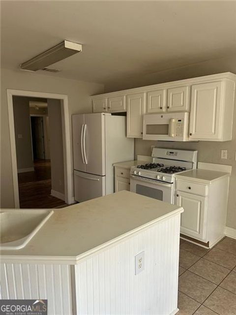 Photo of 5630 SALTCREEK Pl, Sugar Hill, GA 30518 (MLS # 10657828)