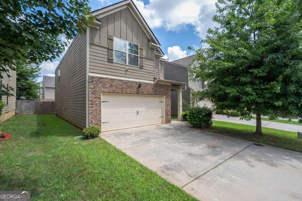 Photo of 565 Dasheill Lane, Atlanta, GA 30349 (MLS # 10819989)