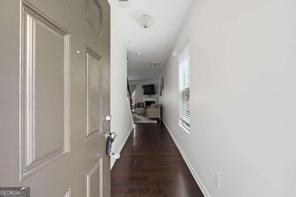 Photo of 565 Dasheill Lane, Atlanta, GA 30349 (MLS # 10819989)