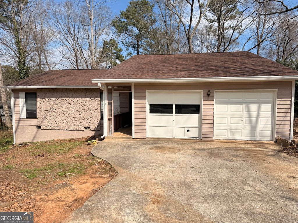 Photo of 6928 Babbling Brook Dr, Rex, GA 30273 (MLS # 10706084)