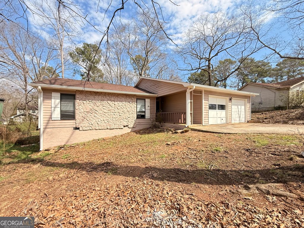Photo of 6928 Babbling Brook Dr, Rex, GA 30273 (MLS # 10706084)